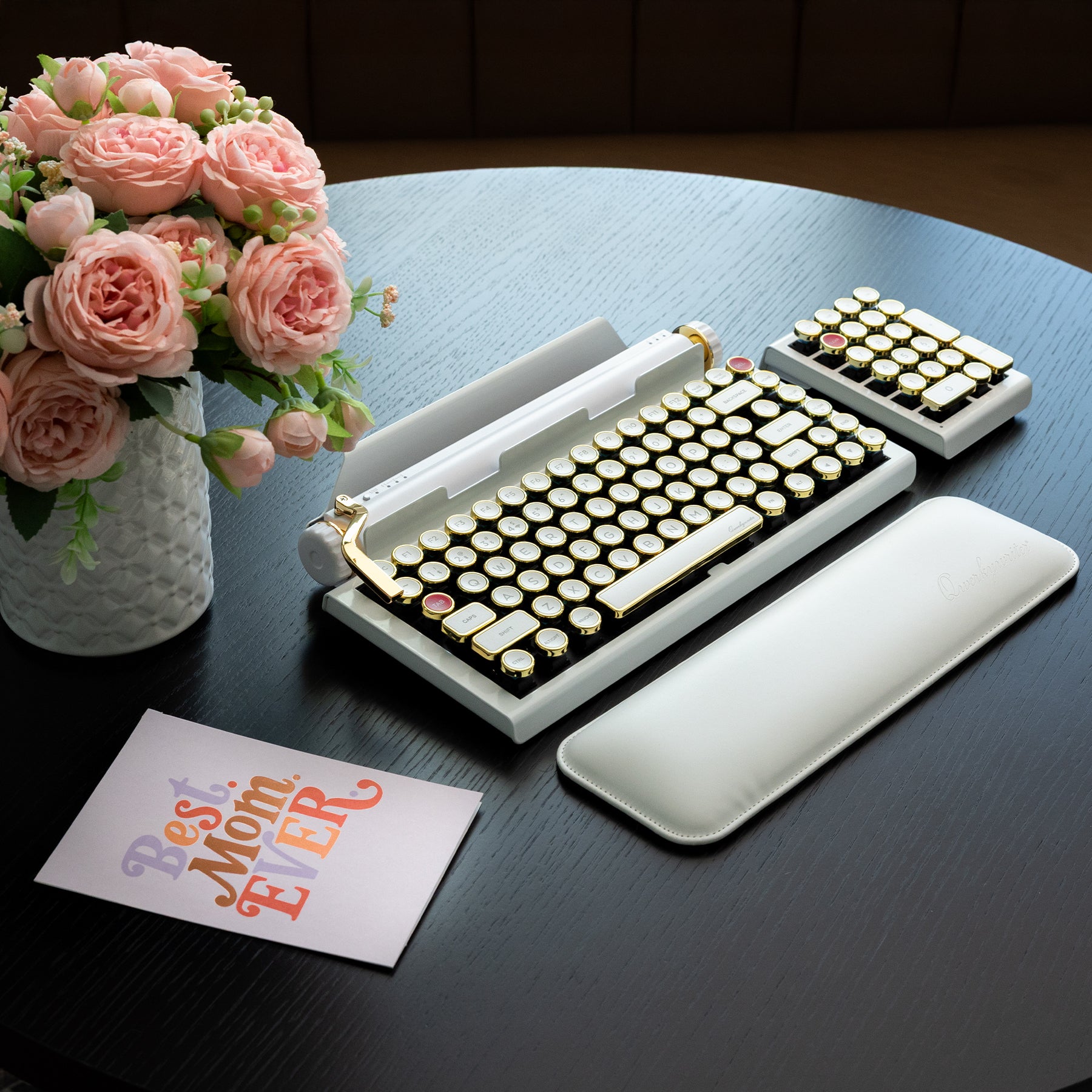 Qwerkywriter typewriter keyboard best in class premium all aluminum body in white gold on dark color wood table