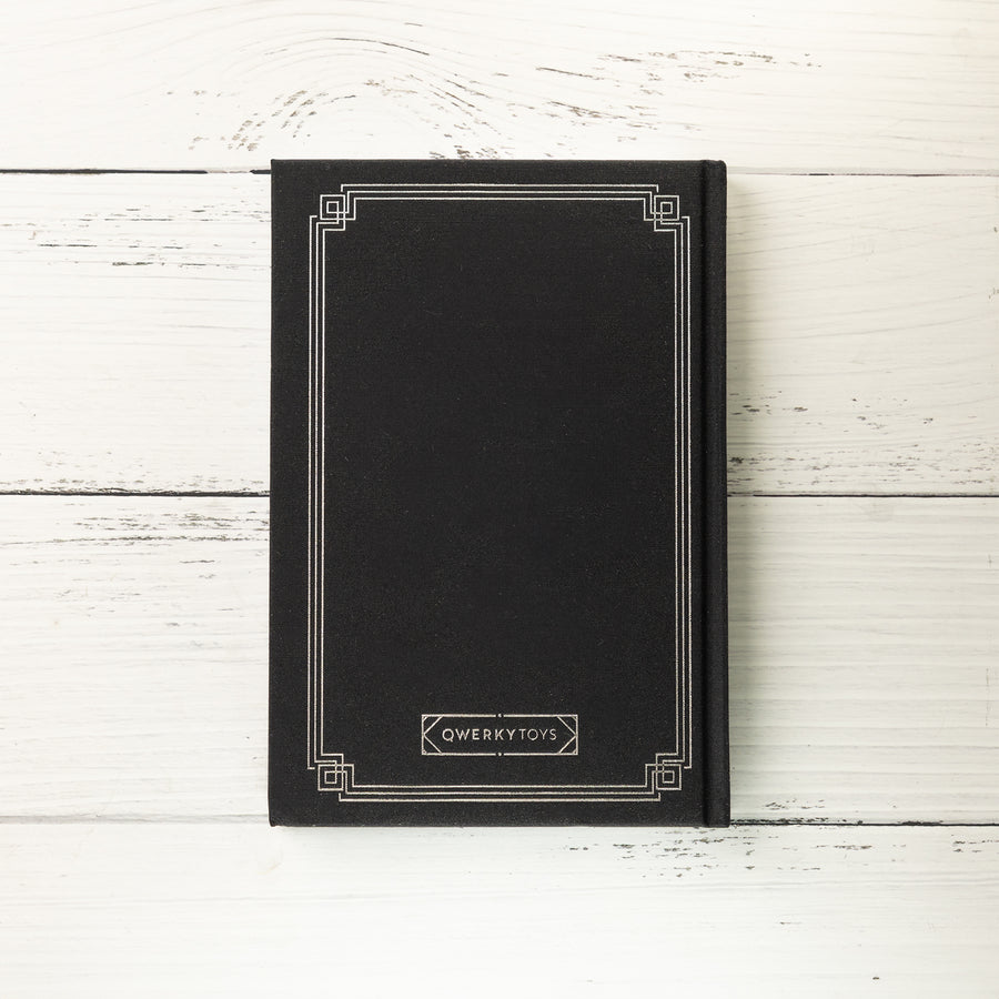 Qwerkywriter Official QWERKYTOYS Lined Journal in black gold and black chrome
