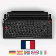 Qwerkywriter typewriter keyboard best in class premium all aluminum body in anniversary dark chrome on white background International Layout French AZERTY