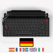 Qwerkywriter typewriter keyboard best in class premium all aluminum body in anniversary dark chrome on white background International Layout German QWERTZ 