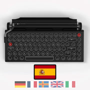 Qwerkywriter typewriter keyboard best in class premium all aluminum body in anniversary dark chrome on white background International Layout Spanish 
