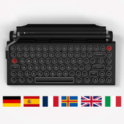 Qwerkywriter typewriter keyboard best in class premium all aluminum body in anniversary dark chrome on white background International Layout United Kingdom UK ISO German Spanish French Nordic Italian QWERTZ AZERTY