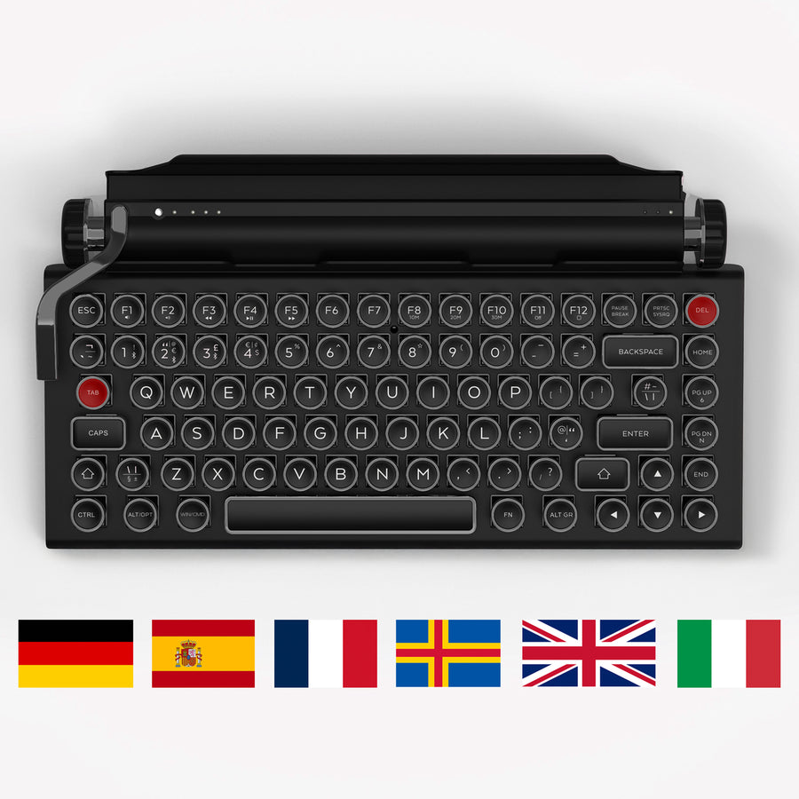Qwerkywriter typewriter keyboard best in class premium all aluminum body in anniversary dark chrome on white background International Layout United Kingdom UK ISO German Spanish French Nordic Italian QWERTZ AZERTY
