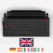 Qwerkywriter typewriter keyboard best in class premium all aluminum body in anniversary dark chrome on white background International Layout United Kingdom UK ISO