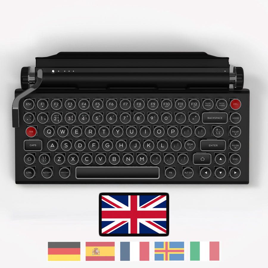 Qwerkywriter typewriter keyboard best in class premium all aluminum body in anniversary dark chrome on white background International Layout United Kingdom UK ISO