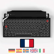 Qwerkywriter typewriter keyboard best in class premium all aluminum body in black chrome on white background International Layout French AZERTY