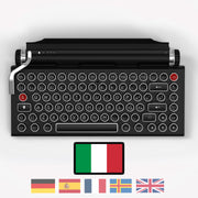 Qwerkywriter typewriter keyboard best in class premium all aluminum body in black chrome on white background International Layout Italian