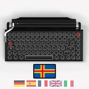 Qwerkywriter typewriter keyboard best in class premium all aluminum body in black chrome on white background International Layout Nordic
