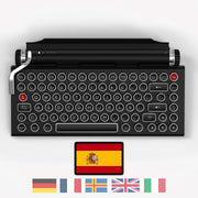 Qwerkywriter typewriter keyboard best in class premium all aluminum body in black chrome on white background International Layout Spanish 