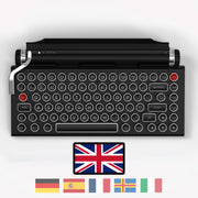 Qwerkywriter typewriter keyboard best in class premium all aluminum body in black chrome on white background International Layout United Kingdom UK ISO