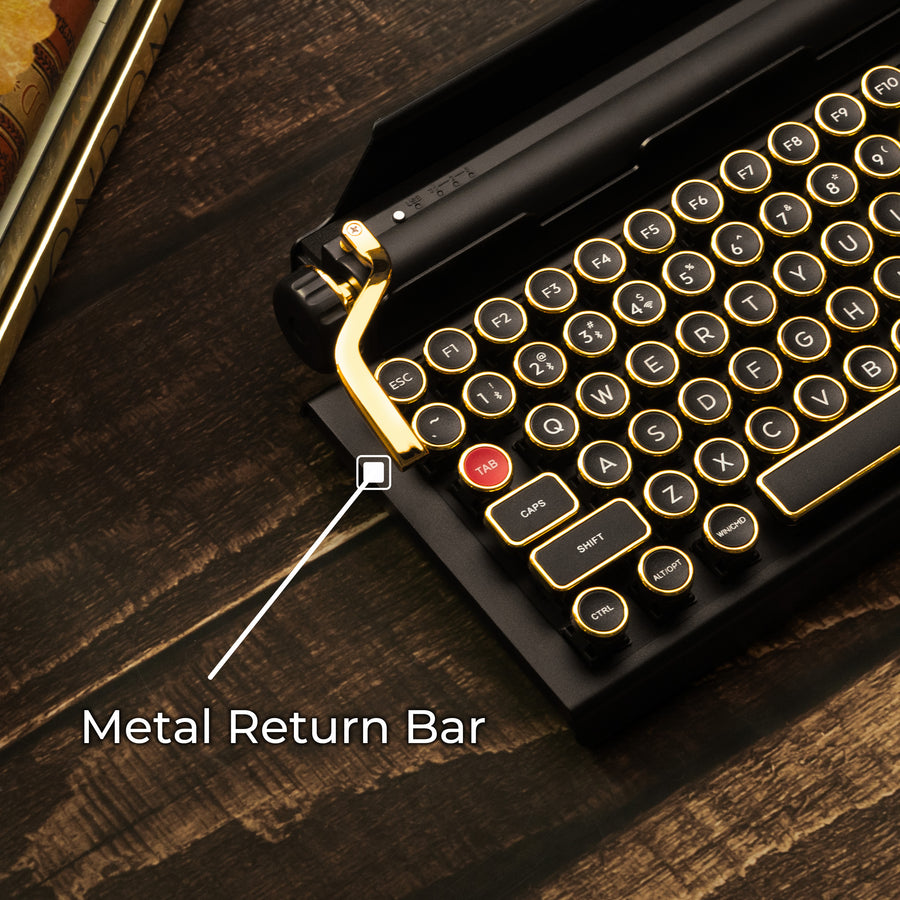 Qwerkywriter typewriter keyboard best in class premium all aluminum body in black gold on brown wood grain background cast metal macro programmable return bar