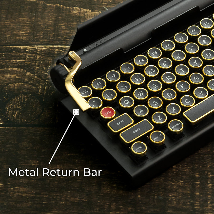 Qwerkywriter typewriter keyboard best in class premium all aluminum body in black gold on brown wood grain background cast metal macro programmable return bar
