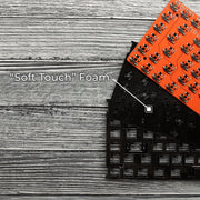 Qwerkywriter typewriter keyboard best in class premium all aluminum body close-up of 'Soft Touch' foam with electronic components on a wooden surface