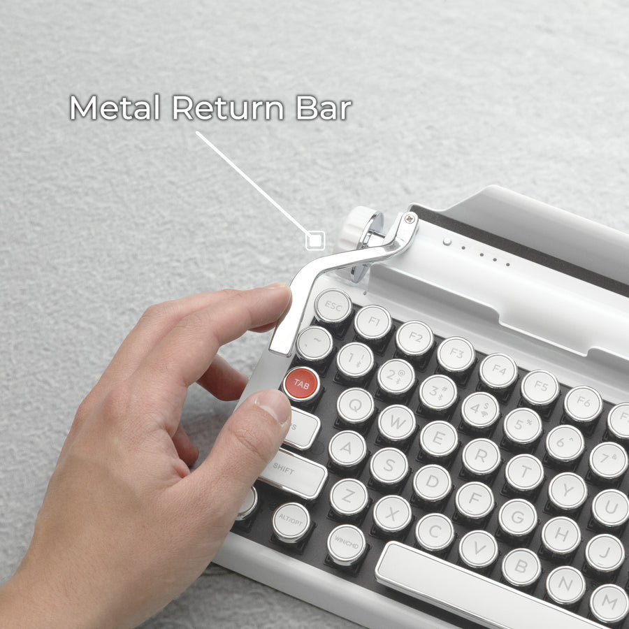 Qwerkywriter typewriter keyboard best in class premium all aluminum body in white chrome on dark wood background with all metal macro programmable return bar