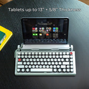 Qwerkywriter typewriter keyboard best in class premium all aluminum body in white chrome on dark wood background with iPad ios Android Samsung Tablet up to 13 inches