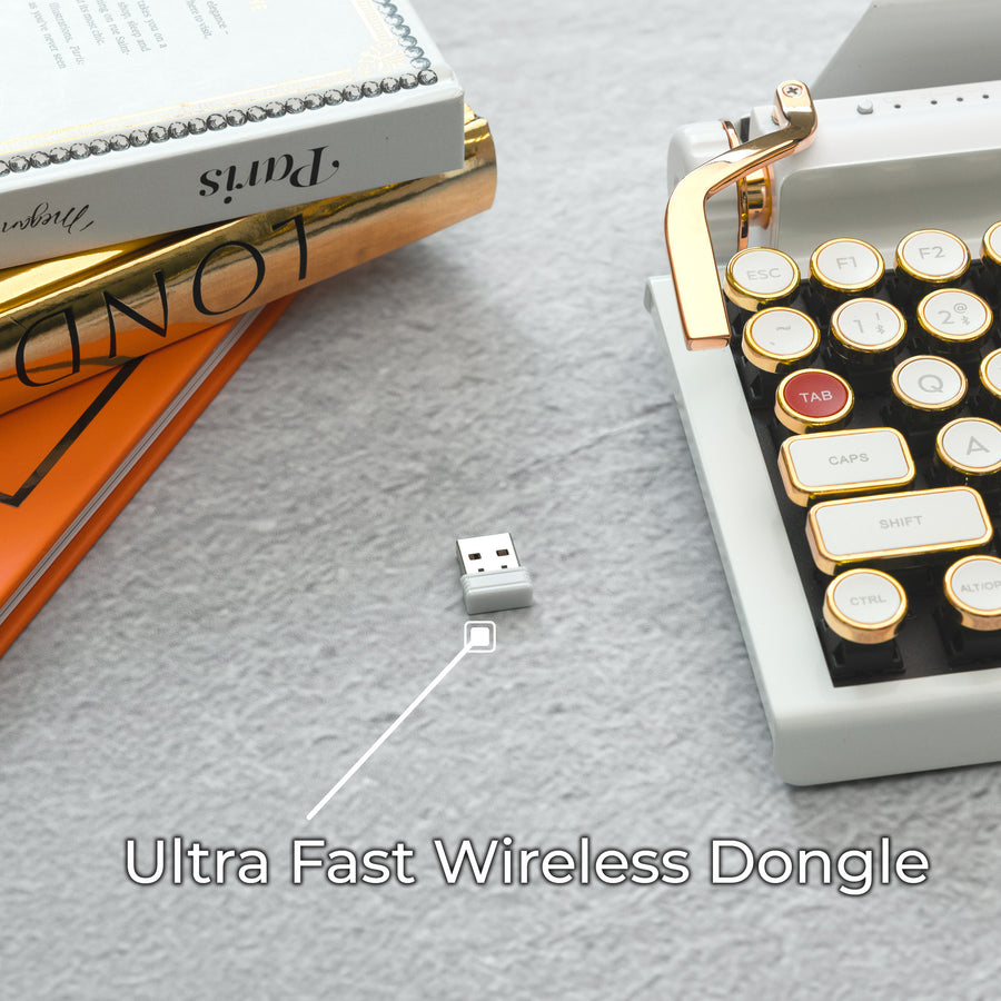 Qwerkywriter typewriter keyboard best in class premium all aluminum body in white gold on light background ultra fast wireless usb dongle callout