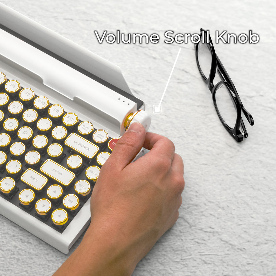 Qwerkywriter typewriter keyboard best in class premium all aluminum body in white gold on light background page scroll and volume knob