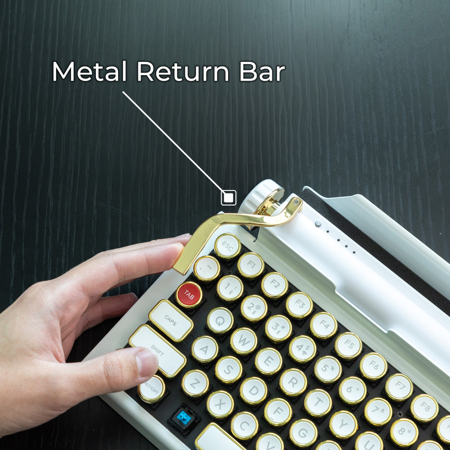Qwerkywriter typewriter keyboard best in class premium all aluminum body in white gold on dark wood background metal macro programmable return bar callout
